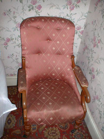 Upholstered armchair