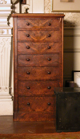 A pair of walnut and burr walnut Wellington chests, English, circa 1860