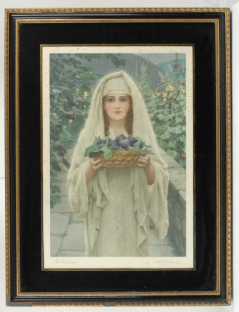 Woman in a garden holding a basket of fruit
