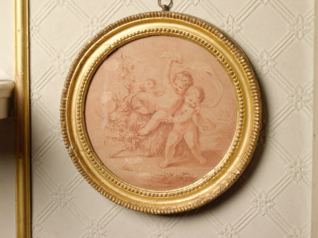 Vignette; an allegorical scene with three putti on and around a goat holding flowers in its mouth
