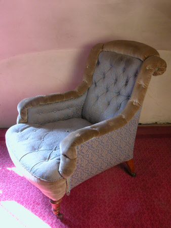 Upholstered armchair