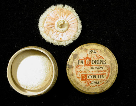 Powder compact