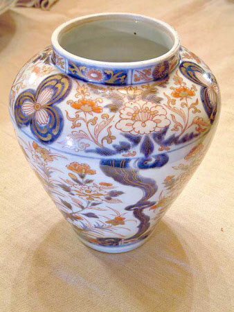 Three Imari vases and covers.