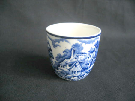 Five earthenware egg cups.