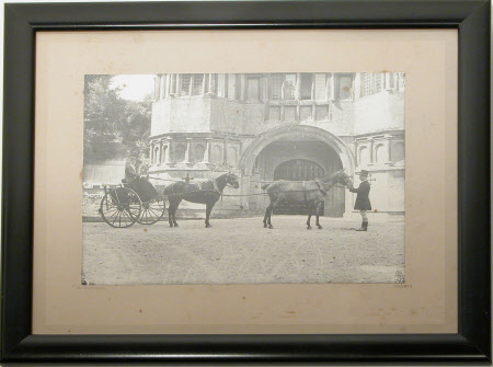 The Hon. Cecil Edward Agar-Robartes (1892-1939) in a dog-cart in front of the gatehouse at ...