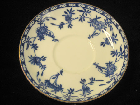 Four china saucers.