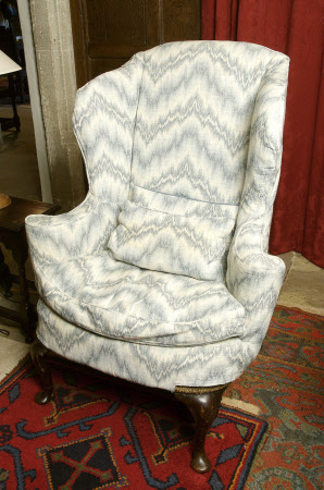 Wing-back armchair