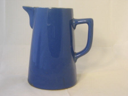 Two hot water jugs with lids.