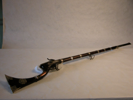 Percussion gun