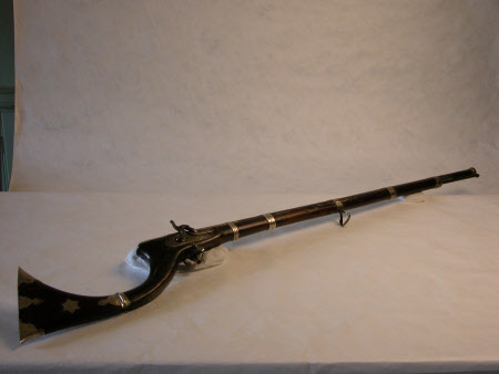 Percussion gun