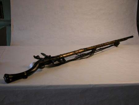Percussion gun