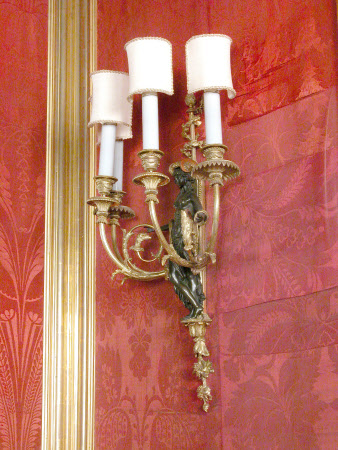 Wall-mounted candelabra