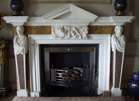Chimneypiece with panel of the Wolf suckling Romulus and Remus, the sides carved with terminal ...