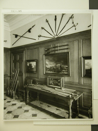 The West Hall, with guns in rack on left, Dyrham Park, Gloucestershire