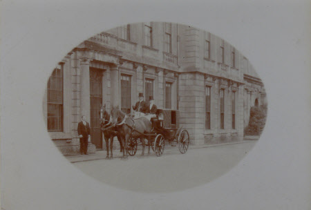 Left to right; Johnny Barber butler, Mr Hayward coachman, Bertram Ellis footman, Brougham outside ...
