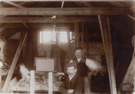 Frederick Moss seated and Walter Lewis standing, Carpenter's Shop, Dyrham, Gloucestershire: ...