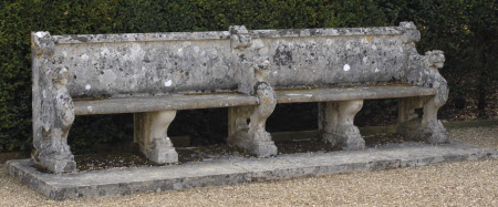 Stone Seat carved with Three Lion Heads and five Paw legs