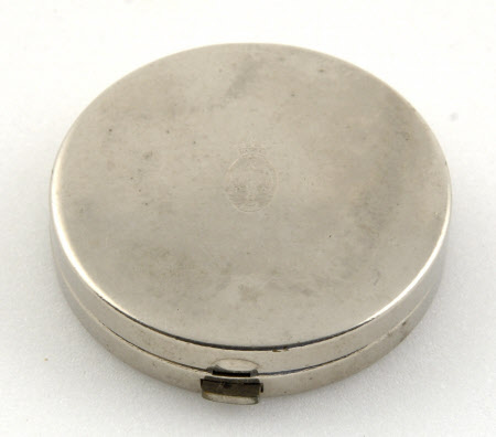 Powder compact