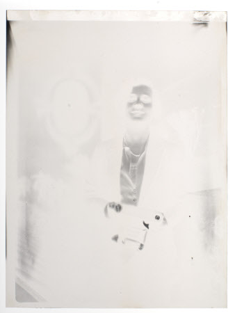 Hilary Margaret Strickland-Constable, Mrs Henry John Ralph Bankes (1908-1966) with a camera