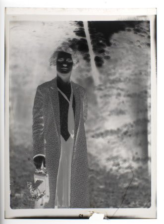 Hilary Margaret Strickland-Constable, Mrs Henry John Ralph Bankes (1908-1966) with a camera 