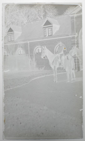 Henry John Ralph Bankes (1902-1981) mounted on his pony outside the stables of Kingston Lacy. 