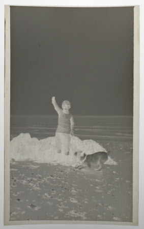 Henry John Ralph Bankes (1902-1981) (Boysie) and Jim the Jack Russell on Studland Beach. 