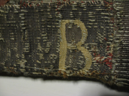 Packwood House. Detail of partial Brussels mark on lower edge of tapestry © National Trust / Helen Wyld