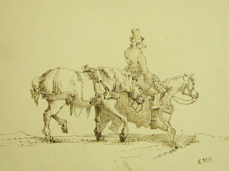 Man on horseback leading another horse