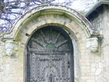 A pair of corbel heads