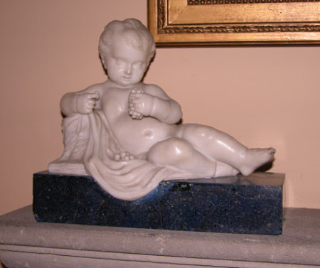 Reclining Putto with Grapes