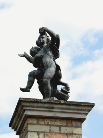 A Bacchic putto and infant satyr