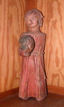 Child holding a Globe