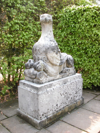 A pair of griffins couchant