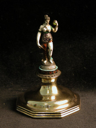 Nymph holding an attribute