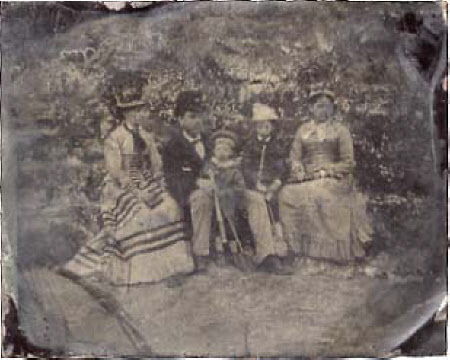 A man, two women and two boys
