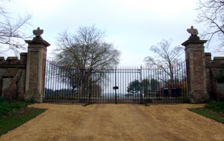 Pair of piers for front gates, topped with a pair of carved eagles.