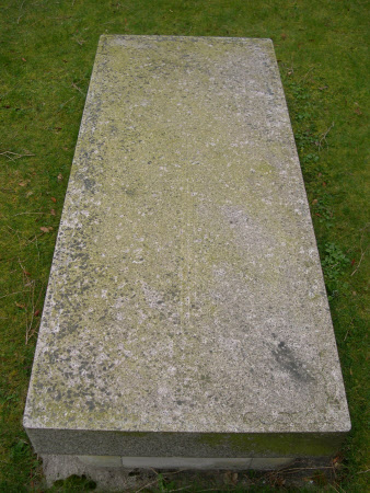 With circle motif at hilt, a large boat design at top of slab.