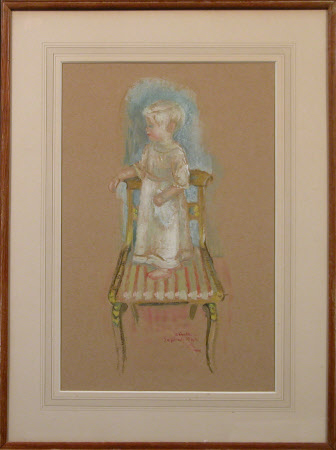 Winston Spencer Churchill (1940 - 2010) as a little boy standing on a chair