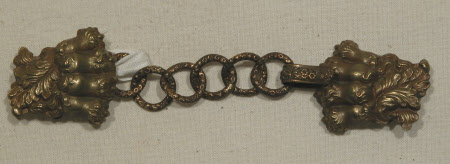 Cloak fastening