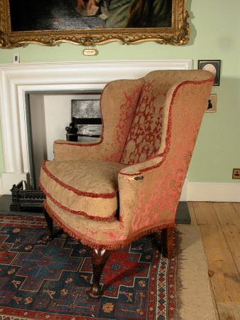 Wing-back armchair