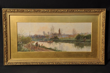 A Barge on a Canal with a Town beyond