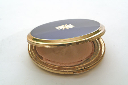 Powder compact