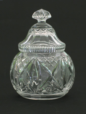 A pair of cut glass bowls with covers.