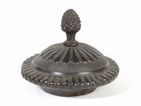 Cover with pinapple finial to the Bacchanalian Urn in the style of Clodion