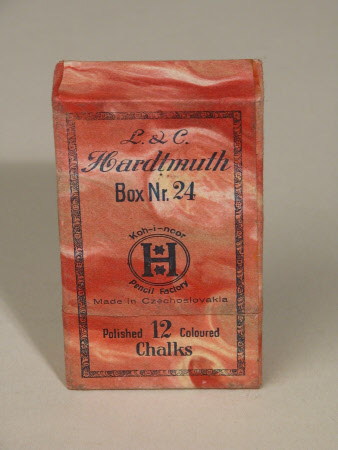 Cardboard sleeve containing twelve crayons