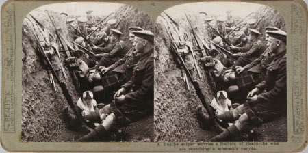 A Bosche sniper worries a Section of Seaforths who are snatching a moment's respite