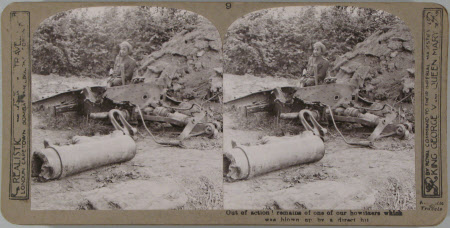 Out of action! remains of one of our howitzers which was blown up by a direct hit.