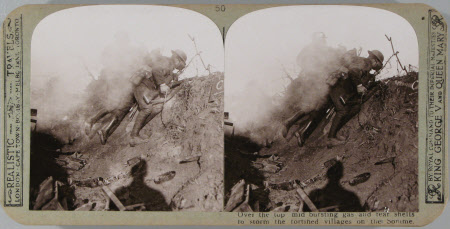 Over the top, amid bursting gas and tear shells, in a determined assault on the fortified villages ...