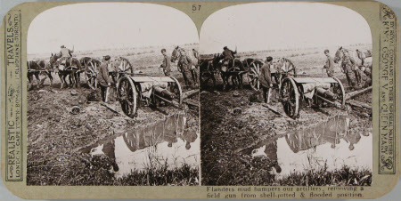 The Flanders mud hampers our artillery: removing a field gun from flooded and shell-pitted 
