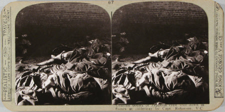 Charred bodies of Zeppelin crew shot down in flames at Billericay by Capt. Robinson, V.C.